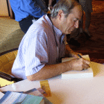 Paul Theroux signing books