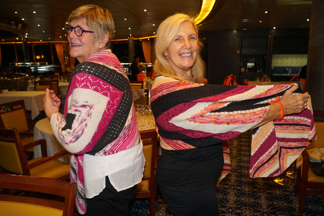 Peggy-and-Judy-model-their-shawls.jpg